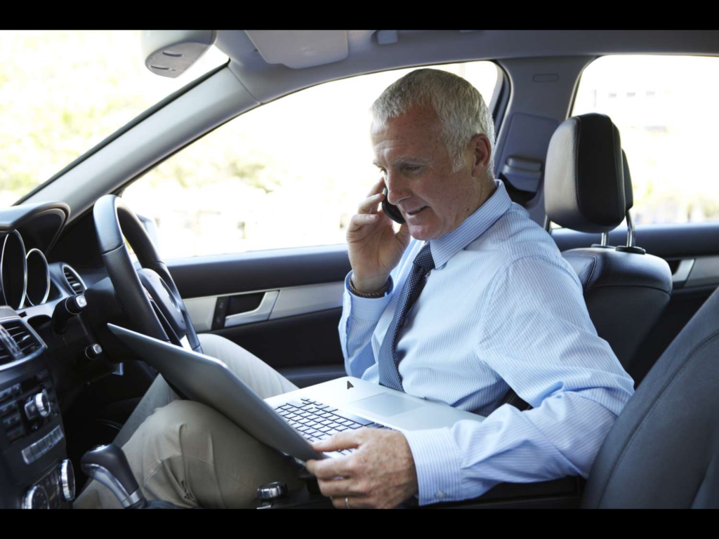 Business owner driving for work and tracking mileage